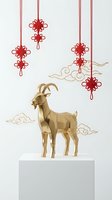 Golden goat statue on white pedestal with hanging red ornamental knots and gold cloud motifs. Asian-inspired festive decoration for holiday displays and celebrations.