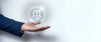 Businessman in navy suit holding glowing anchor icon in transparent sphere, representing maritime business, shipping industry, and nautical commerce solutions.