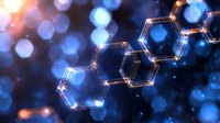 Glowing hexagonal molecular structure with blue and orange light effects on dark background, scientific concept for chemistry, technology and research.