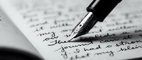 Fountain pen writing on handwritten letter or document with cursive text in black and white monochrome for correspondence, communication, or literary content.