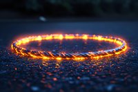 Glowing magical ring of fire on dark textured surface with bokeh light effects and sparks. Mystical fantasy concept for spiritual and magical designs.