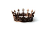 Antique bronze royal crown with ornate fleur-de-lis design and intricate filigree details photographed on white background, isolated for creative projects and designs.