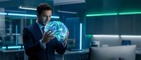 Businessman in dark suit holding glowing digital globe with neural network patterns in modern office with neon lighting, representing global technology and innovation.