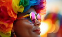 Young African American woman wearing rainbow flower crown and reflective sunglasses at pride celebration, smiling with colorful bokeh background. Pride concept.