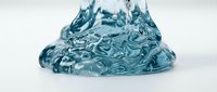 Transparent blue gel or slime substance with flowing, organic texture isolated on white background, suitable for design projects, packaging, and digital applications.