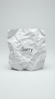 Crumpled white paper with the word Sorry written on it, symbolizing apology, regret, and forgiveness on a light gray background.