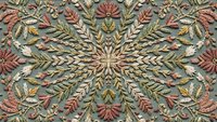 Intricate mandala pattern with autumn leaves in warm earth tones, seamless design for textile, wallpaper and decorative backgrounds.