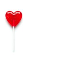 Red heart-shaped lollipop candy on white stick isolated on white background for Valentine's Day romance sweet treat confectionery design projects.