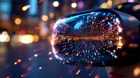 Vibrant city lights and bokeh reflections captured in car side mirror at night creating magical urban perspective with glowing blue and orange colors. Artistic street photography.