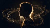 Young woman silhouette surrounded by glowing golden particles and light trails creating magical atmosphere for fantasy and inspiration concepts.