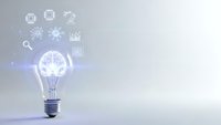 Glowing light bulb with brain inside surrounded by technology icons on gradient background representing innovation and artificial intelligence concepts.