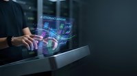 Businessman using futuristic holographic interface with digital icons and data visualization for modern technology and business innovation concepts.