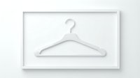 White clothes hanger inside a white rectangular frame on a light background, minimalist fashion and retail concept.