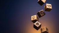 Wooden cubes with business icons floating against gradient blue and orange background, representing innovation, strategy, and corporate solutions for marketing and design projects.