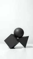 Abstract black geometric shapes balanced composition with sphere cube and triangle on white background for modern design projects.