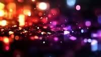 Vibrant bokeh lights create magical atmosphere with orange and purple gradient colors on dark background, defocused glowing particles float in space.