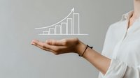 Professional woman holding virtual growth chart graph above palm, demonstrating business success and financial progress against neutral background.