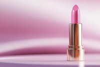 Pink lipstick in metallic gold tube standing on soft pink background with gentle gradient lighting effect, luxury cosmetic product photography.