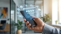 Customer experience rating concept with businessman holding smartphone displaying four star review and digital feedback icons in modern office environment.