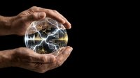 Male hands holding glowing sphere with illuminated neural network connections against dark background, representing technology, innovation, artificial intelligence, and future digital solutions.