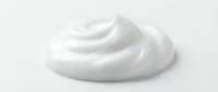 Whipped white cream or mousse swirl isolated on white background, ready for cosmetics, food, and design applications.