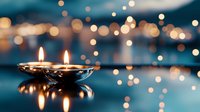 Floating candles in silver holder against blurred city lights at dusk, creating romantic atmosphere for evening celebrations and special occasions.
