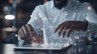 African American businessman working on digital tablet with glowing network visualization, innovative technology concept for business solutions and data analysis.