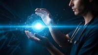 Young Asian woman doctor holding glowing blue energy sphere with digital particles in futuristic medical technology concept for healthcare innovation.