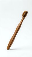 Eco-friendly bamboo toothbrush isolated on white background for sustainable dental care and zero waste lifestyle products.