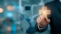 Businessman in dark suit touching glowing cross symbol with blurred medical facility background, representing healthcare technology, faith-based medicine, and digital health innovation.