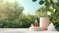 Natural cosmetic serum bottle and pink ceramic cup on concrete podium with rose quartz crystals against green garden background in morning sunlight.