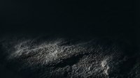 Textured sand surface with dramatic lighting and shadows, suitable for backgrounds, design projects, and nature-themed compositions.