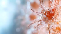 Abstract orange liquid splash with dynamic flowing motion and light reflections creating artistic fluid patterns for modern design projects.