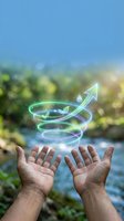 Hands presenting glowing green spiral with growth arrow and water drop symbolizing sustainable development and environmental protection in nature.