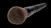 Makeup brush with natural bristles and black handle isolated on transparent background, ready for beauty product design, tutorials, and cosmetic packaging graphics.