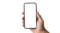 Hand holding modern smartphone with blank white screen isolated on white background for mockup and app presentation purposes.