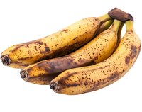 Ripe spotted bananas with brown marks on yellow peel isolated on white background, fresh organic fruit ready for cooking or smoothies.