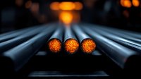 Glowing orange lights in dark industrial tubes create dramatic perspective composition with selective focus on three illuminated circular elements.