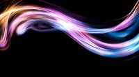 Colorful flowing light waves in pink, orange and blue create dynamic motion effect on black background. Abstract design element for modern layouts.