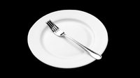 Elegant white dinner plate with polished silver fork isolated on transparent background, ready for restaurant menus, dining design projects, tableware graphics, print-on-demand products and culinary marketing materials.