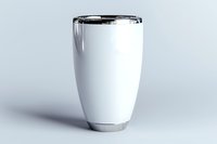 White stainless steel tumbler with black lid on light background, modern minimalist travel mug isolated for easy digital integration into marketing designs.