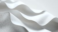 Minimalist white wavy surface with subtle texture and soft shadows creating abstract flowing lines and gentle curves in monochromatic grayscale composition.