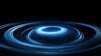 Glowing blue spiral light trails create dynamic circular motion against dark background, abstract cosmic energy pattern suggesting galaxy or quantum physics concept.