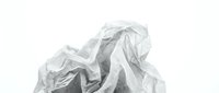 Crumpled transparent plastic bag isolated on white background, suitable for packaging design, environmental awareness graphics, and waste management illustrations.