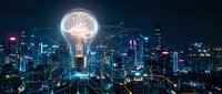 Glowing brain lightbulb with network connections over futuristic smart city skyline at night representing artificial intelligence and innovation technology.
