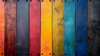 Vibrant multicolored wooden planks with rustic texture and metal rivets create rainbow pattern background. Weathered boards in orange, red, yellow, turquoise and blue tones.