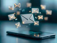 Glowing email envelope icons floating above smartphone screen in dark blue background, concept of mobile messaging and digital communication.
