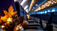 Autumn leaves and pine cones decorating airplane cabin interior with warm bokeh lights creating cozy seasonal travel atmosphere during flight journey.