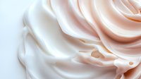 Soft peach and white cream swirls creating elegant abstract waves and curves with gentle shadows and highlights, suitable for luxury beauty and spa marketing backgrounds.