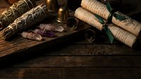 Ancient scrolls and sage bundles on rustic wooden table with mystical crystals and candles creating atmospheric spiritual workspace for meditation rituals.